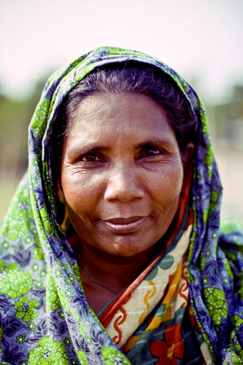 Bangladesh woman wearing a colorful scarf on her head